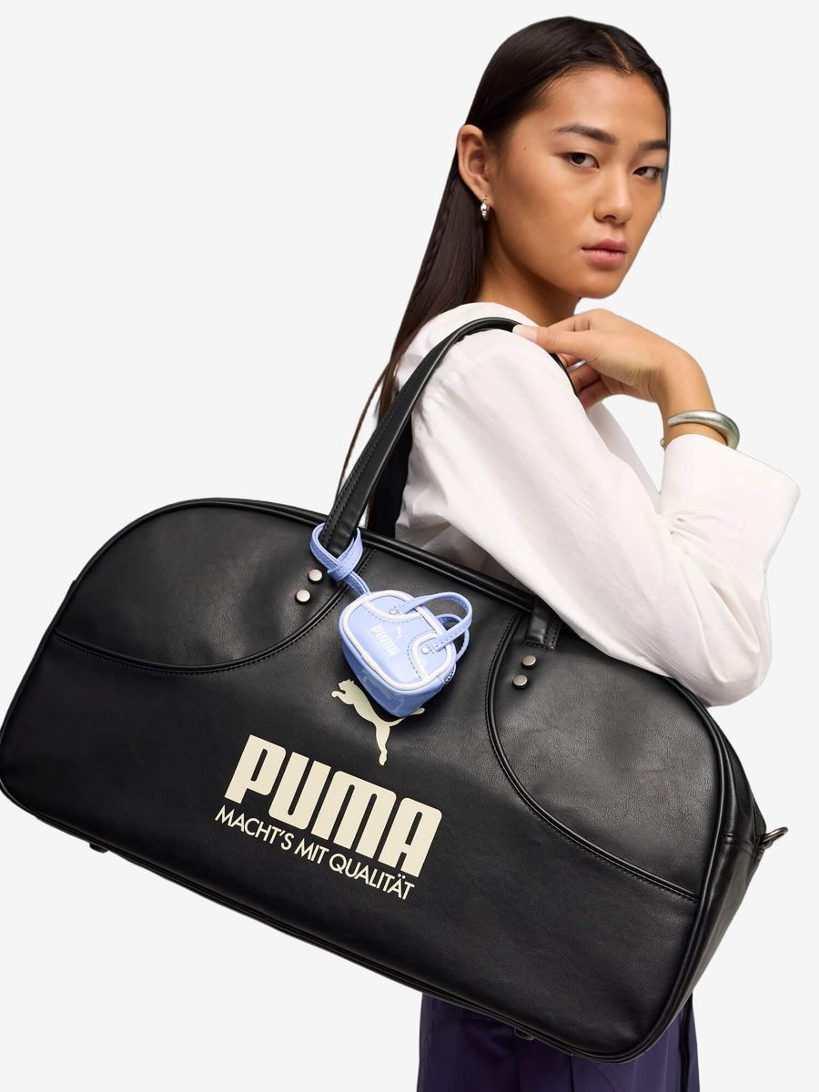 PUMA — Сумка 1976 0.2L Grip Bag Keychain Intense Lavender